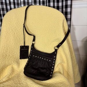 Black leather Juicy Couture purse.